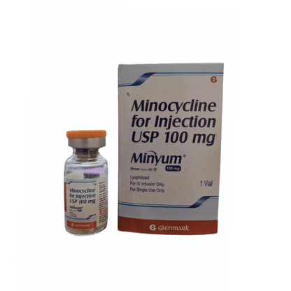 Perspective view showing the Minyum 100 mg box alongside its sterile glass vial with an orange cap containing lyophilized powder by Glenmark.
