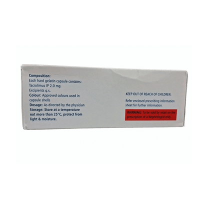 Box of medication with text and a warning label on a white background