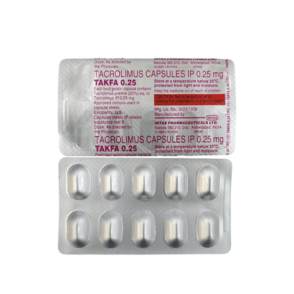 Packaging of Tacrolimus capsules with red label on a white background